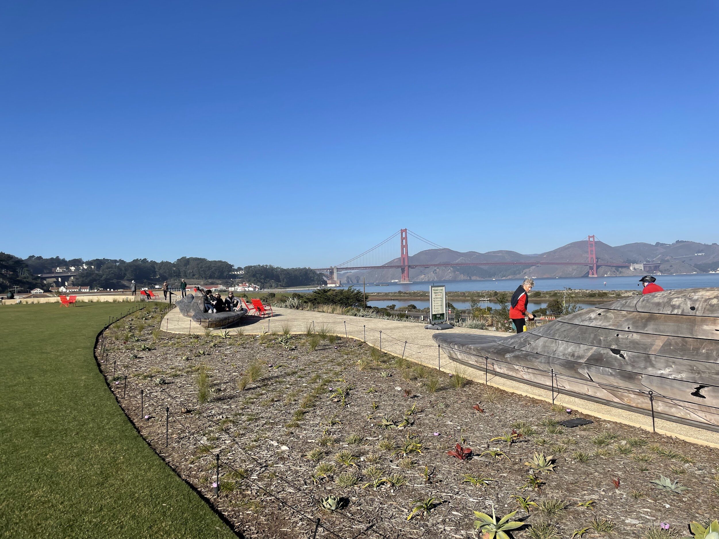 A view of the Presidio Tunnel Tops with Golden Gate Bridge in the background